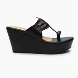 Wedge Kohalpuris black side profile with heel