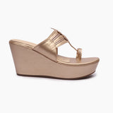 Wedge Kohalpuris rose gold side profile with heel