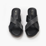 Shimmer Cross Slip Ons black front angle