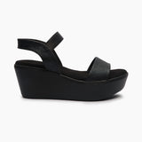 Shimmery Wedge Sandals black side profile with heel