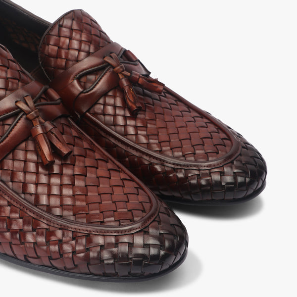 Hand Woven Tassle Moccasins side angle zoom