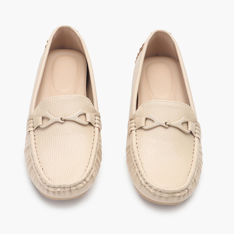 Snake Textured Buckle Accented Loafers beige front angle