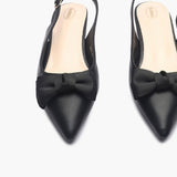 Bow Accented Flat Mules black front zoom
