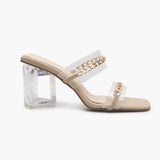 Sculptural Acrylic Heels with Chainlink Embellishment cream side profile with heel