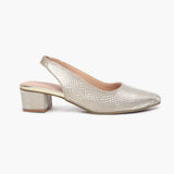 Closed Toe Backstrap Mules gold side profile with heel