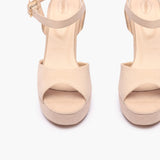 Bold Platform Sandals beige front angle zoomed in