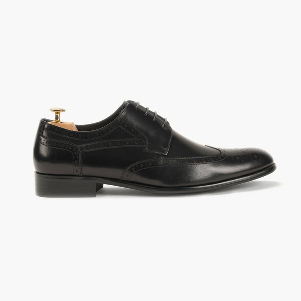The Classic Brogue black side profile with heel